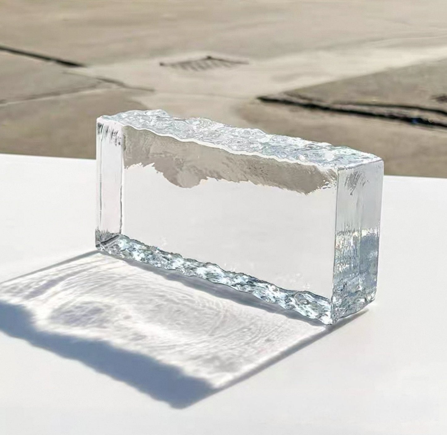 Glacier Crest glass brick close-up with ice-textured edges by MIOLISM