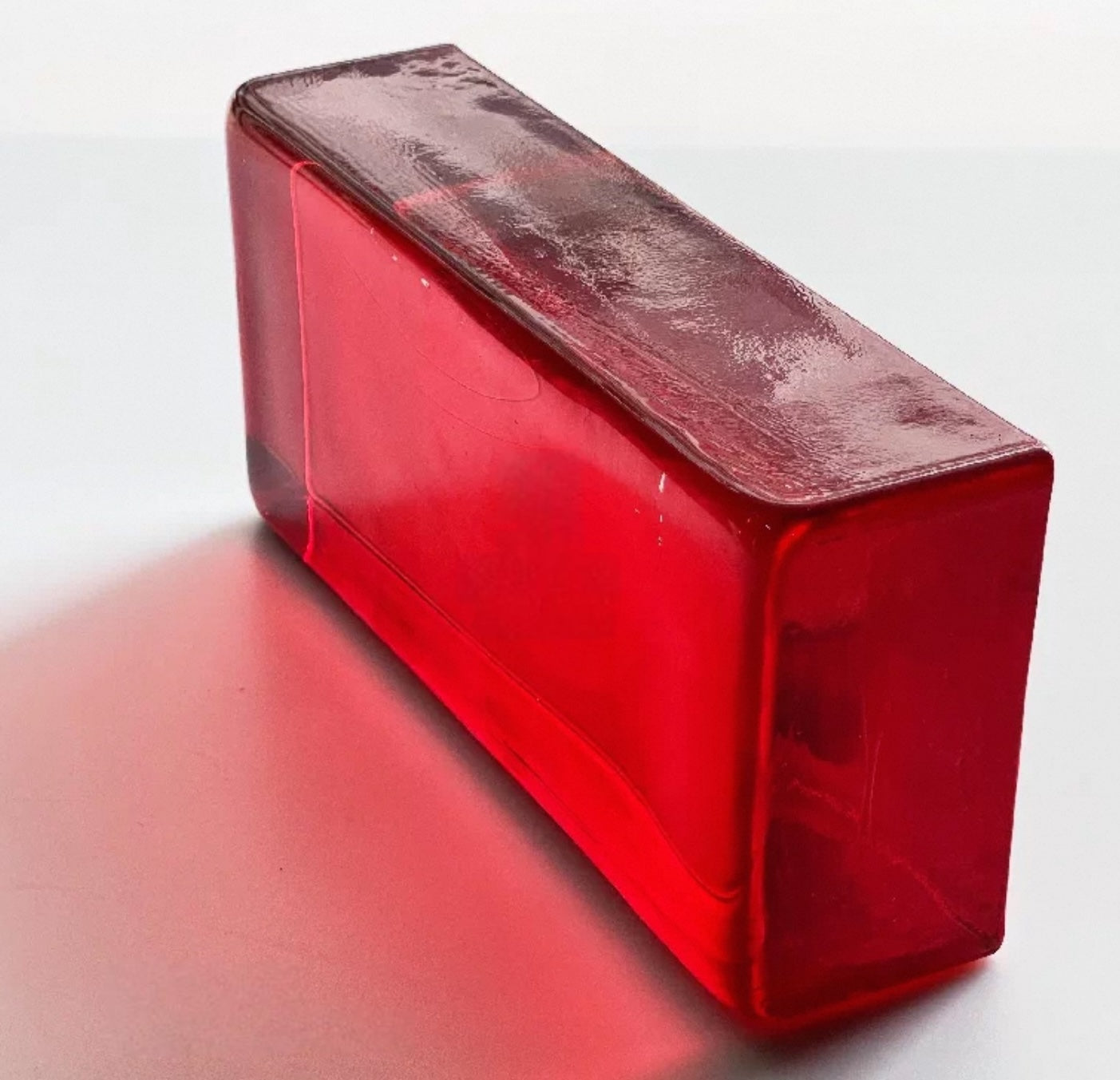 Crimson Block red translucent glass brick for bold interior accents by MIOLISM