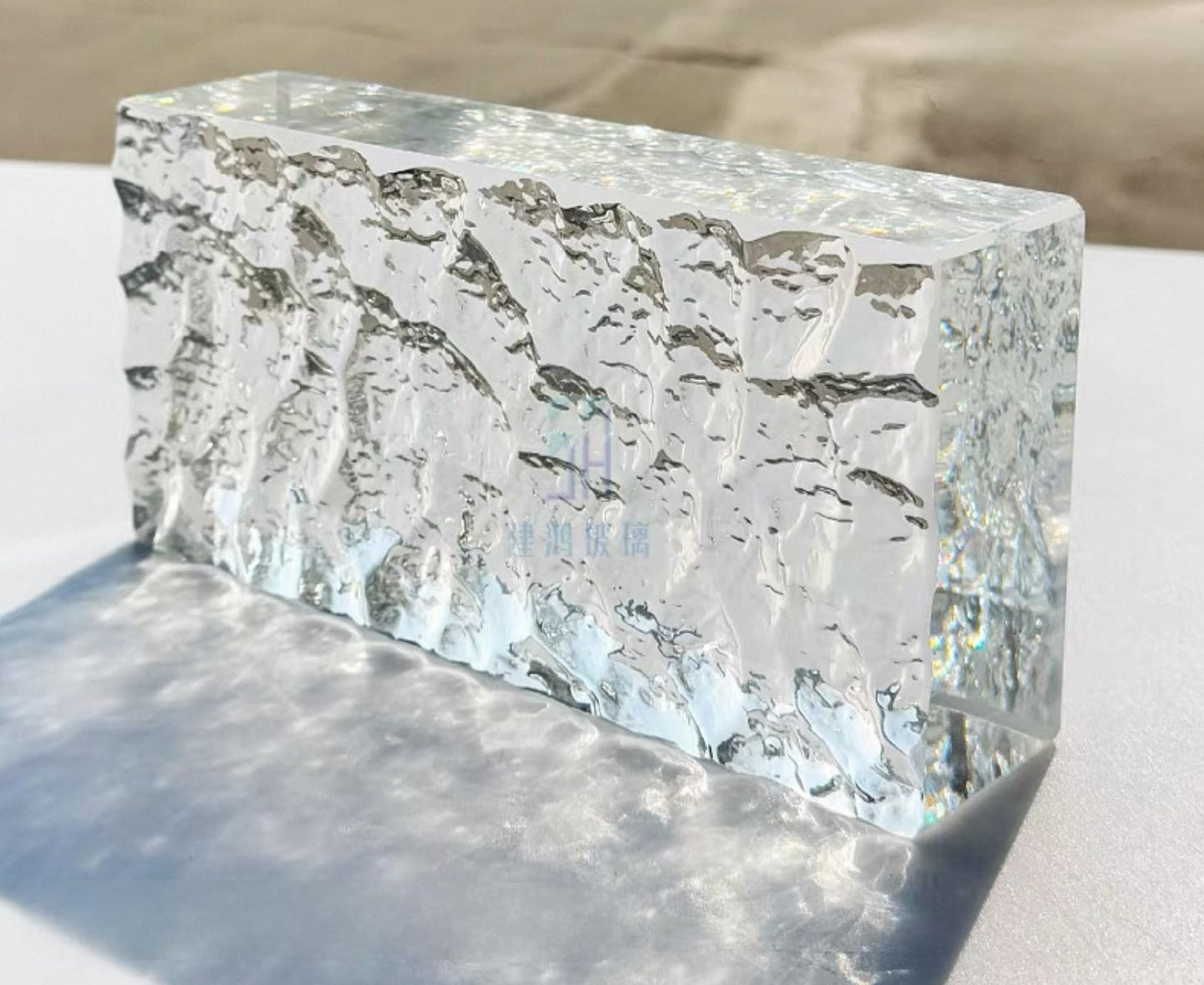 Glacier Face glass brick with ice-cracked texture and clear reverse by MIOLISM