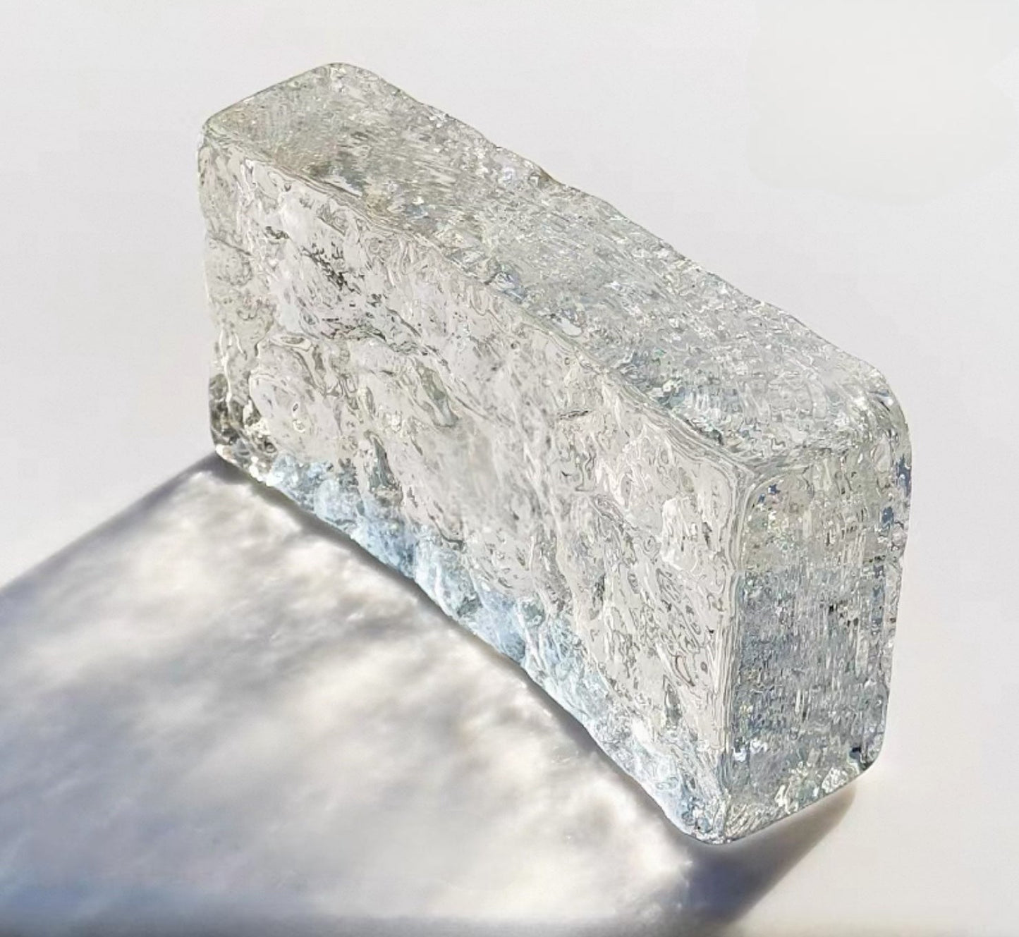 Dual-Face Curved Glacier glass brick with rounded ice texture by MIOLISM