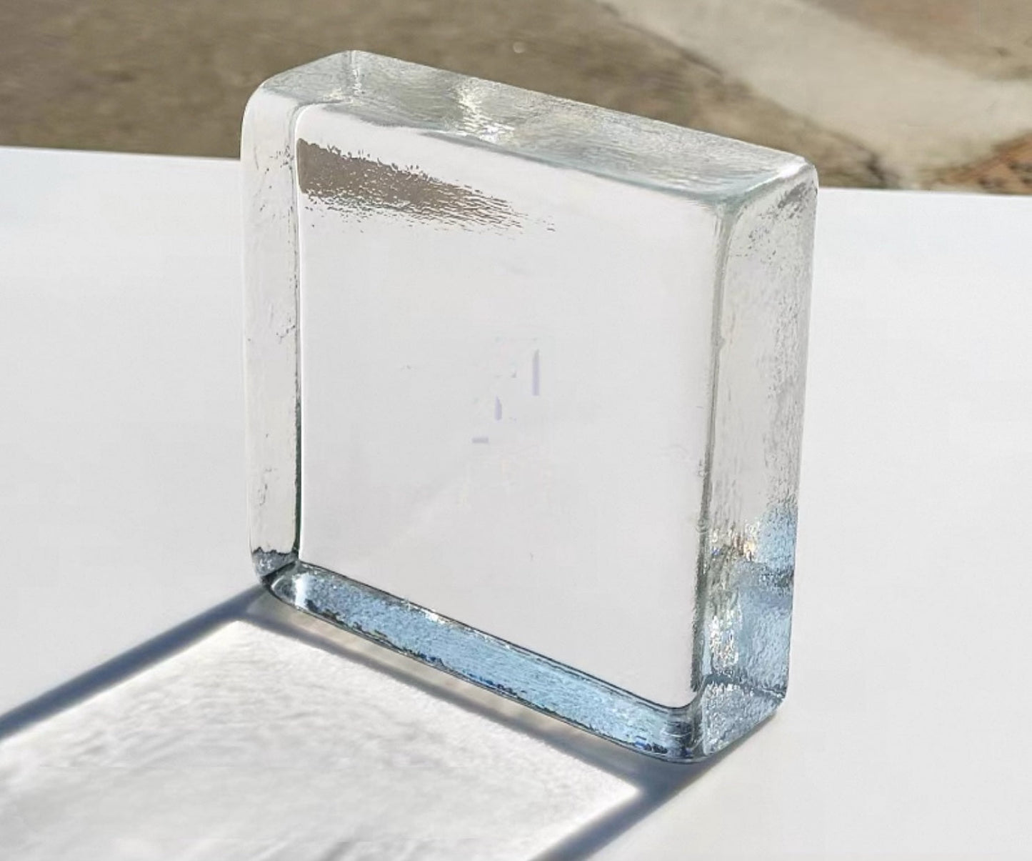 Ripple Edge square glass brick with rounded water-textured surface by MIOLISM