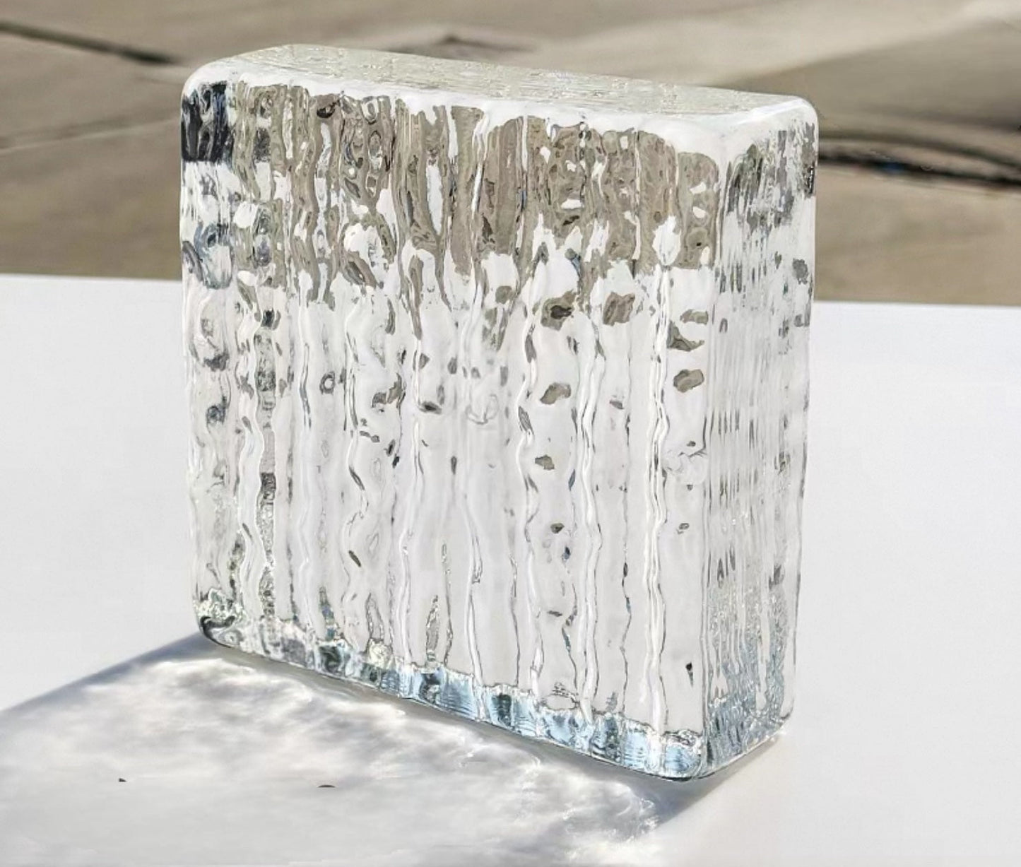 Dual-Face Striated glass brick with vertical ripple grooves by MIOLISM
