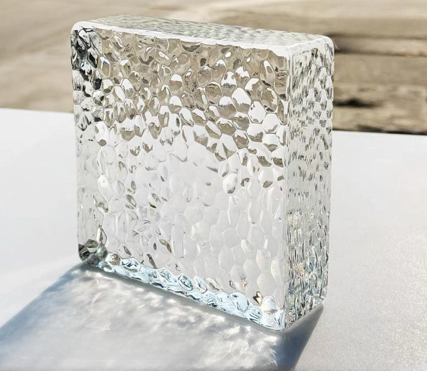 Dual-Face Honeycomb glass brick with geometric textured pattern by MIOLISM