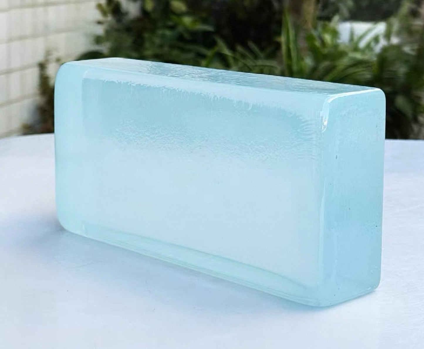 Rounded Edge Ripple Aqua Blue glass brick with soft water-like glow by MIOLISM