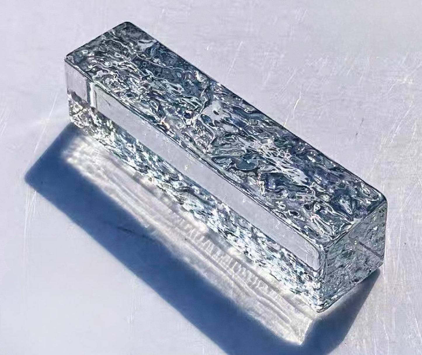 Dual-Face Ice Crystal narrow glass brick with sculpted texture by MIOLISM