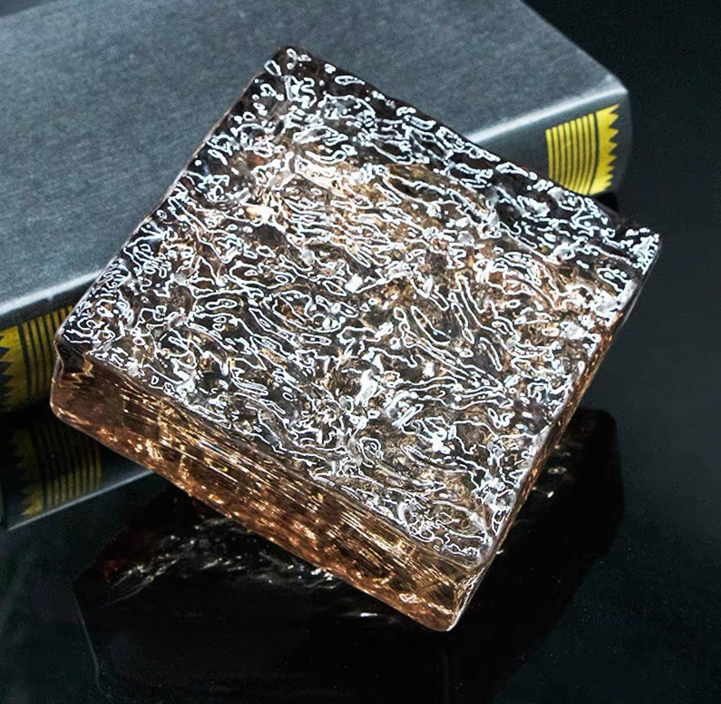 Ice Crystal Smoked Amber glass brick with warm crackled texture by MIOLISM