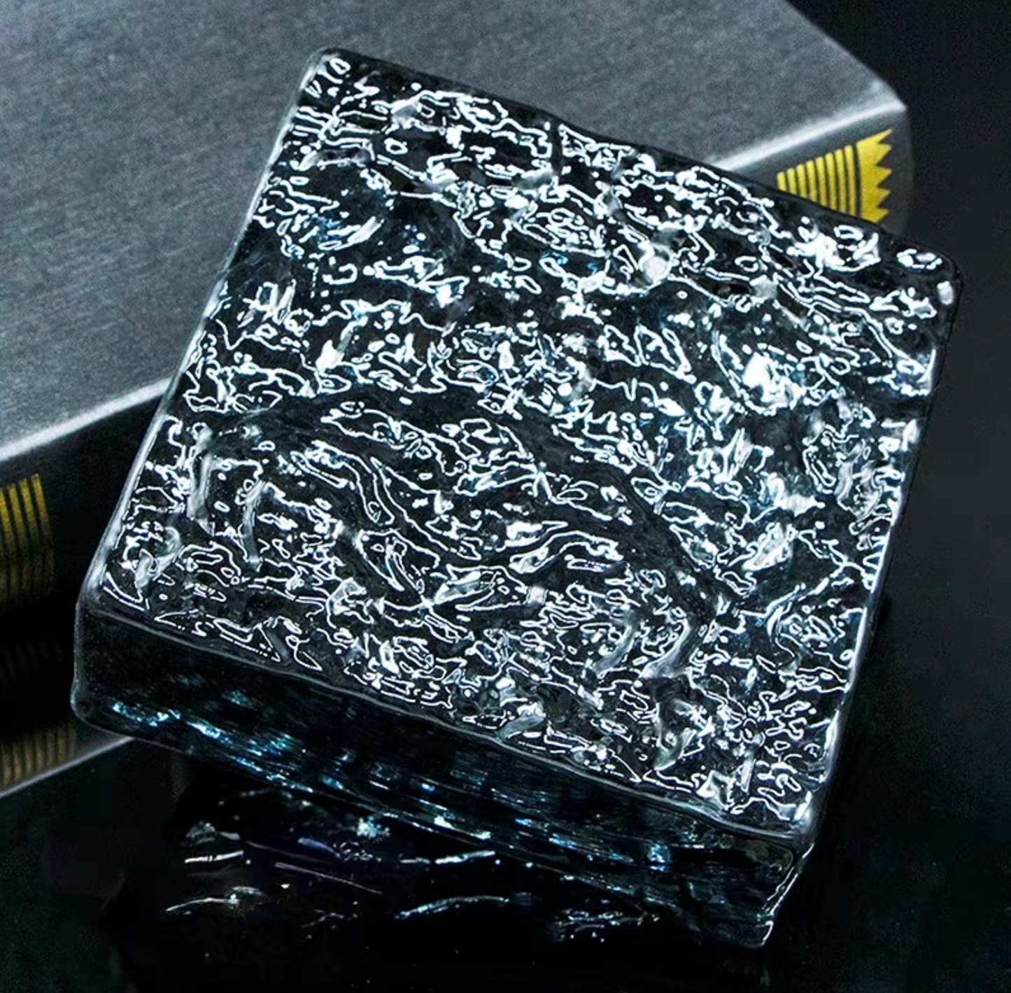 Ice Crystal Graphite Drift smoky gray glass brick with glacial texture by MIOLISM