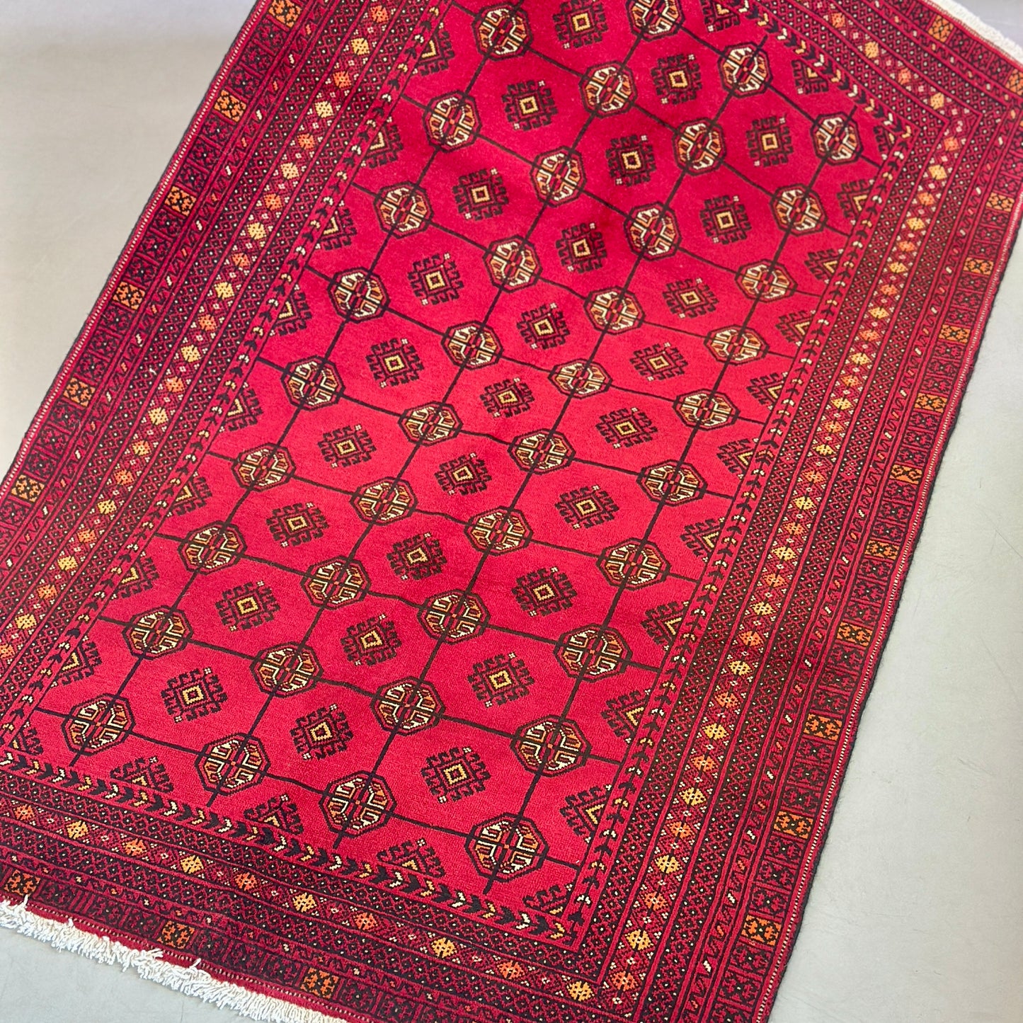 The Crimson Legacy Turkmen Handwoven Wool Rug (1990s Collection)