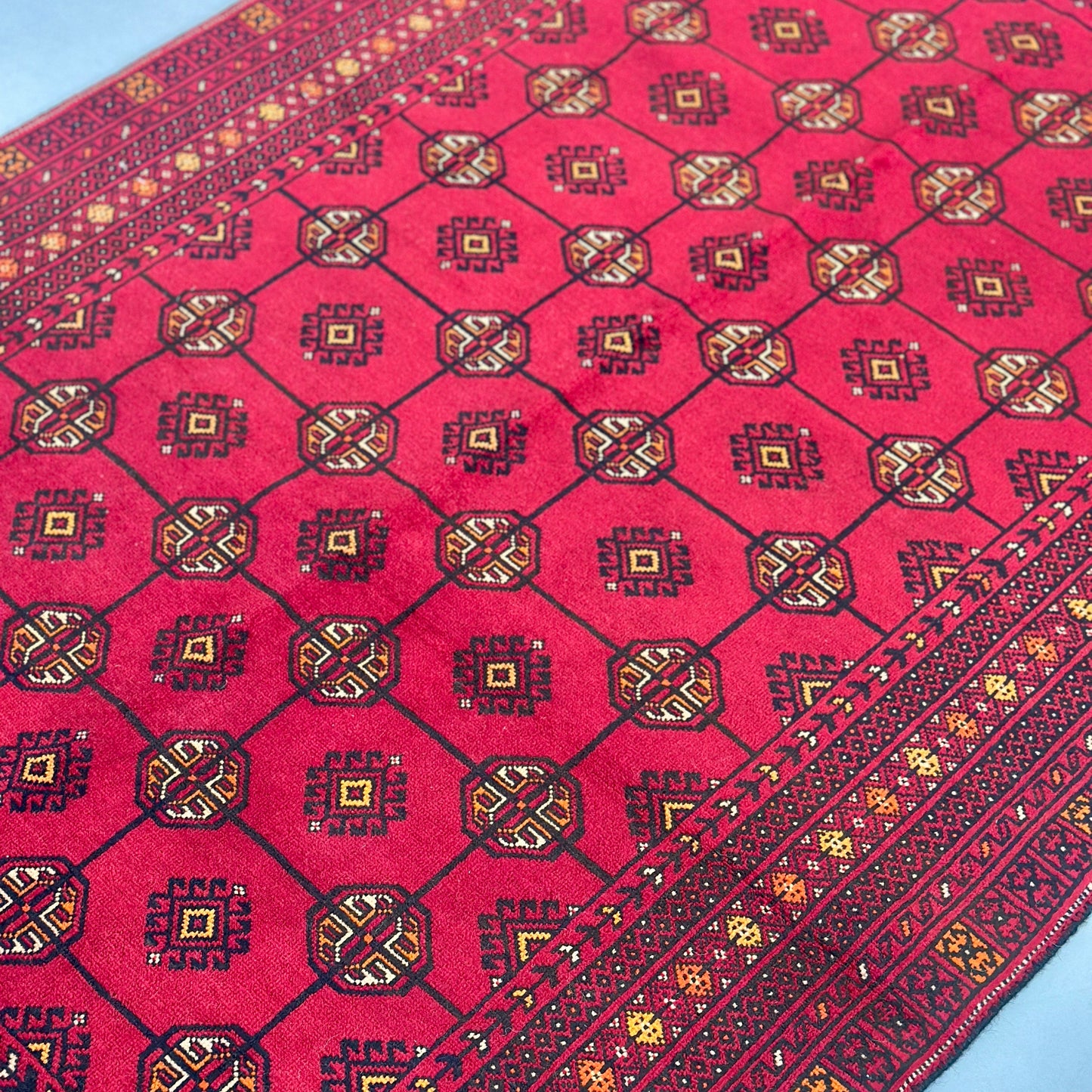 The Crimson Legacy Turkmen Handwoven Wool Rug (1990s Collection)