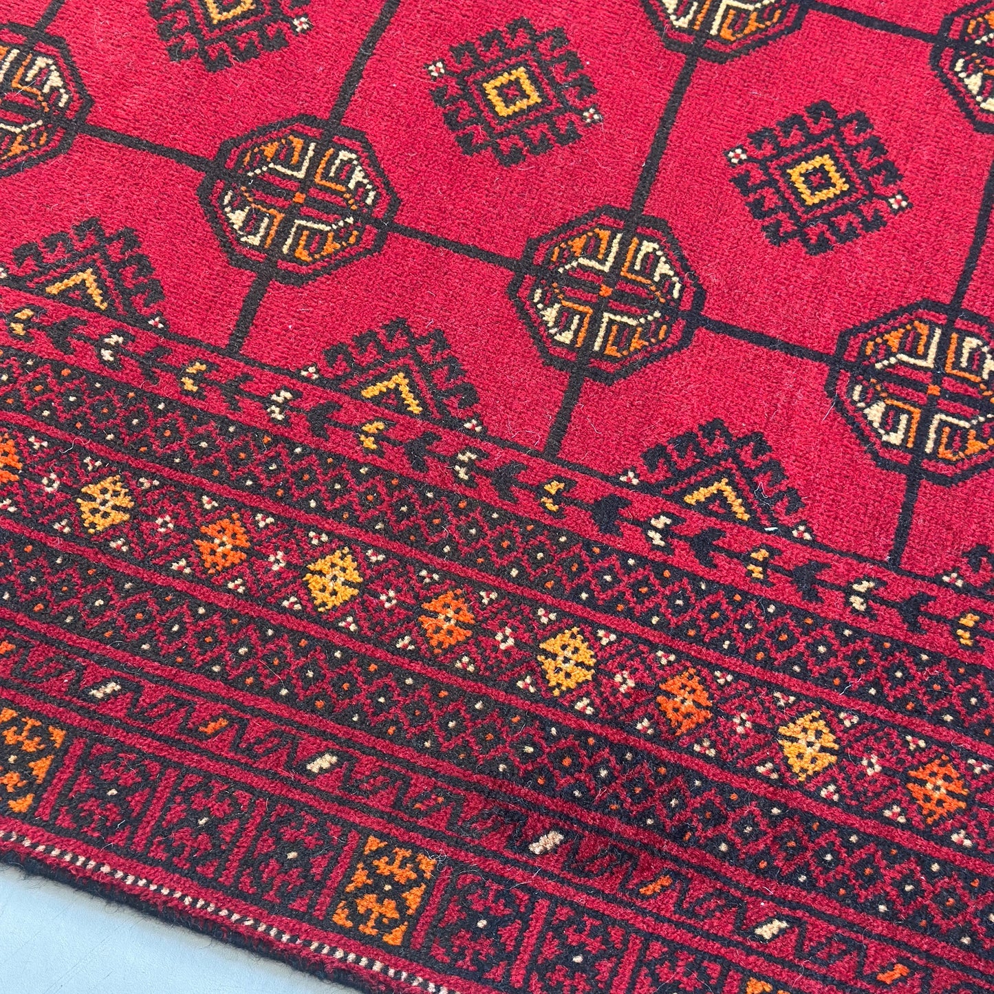 The Crimson Legacy Turkmen Handwoven Wool Rug (1990s Collection)