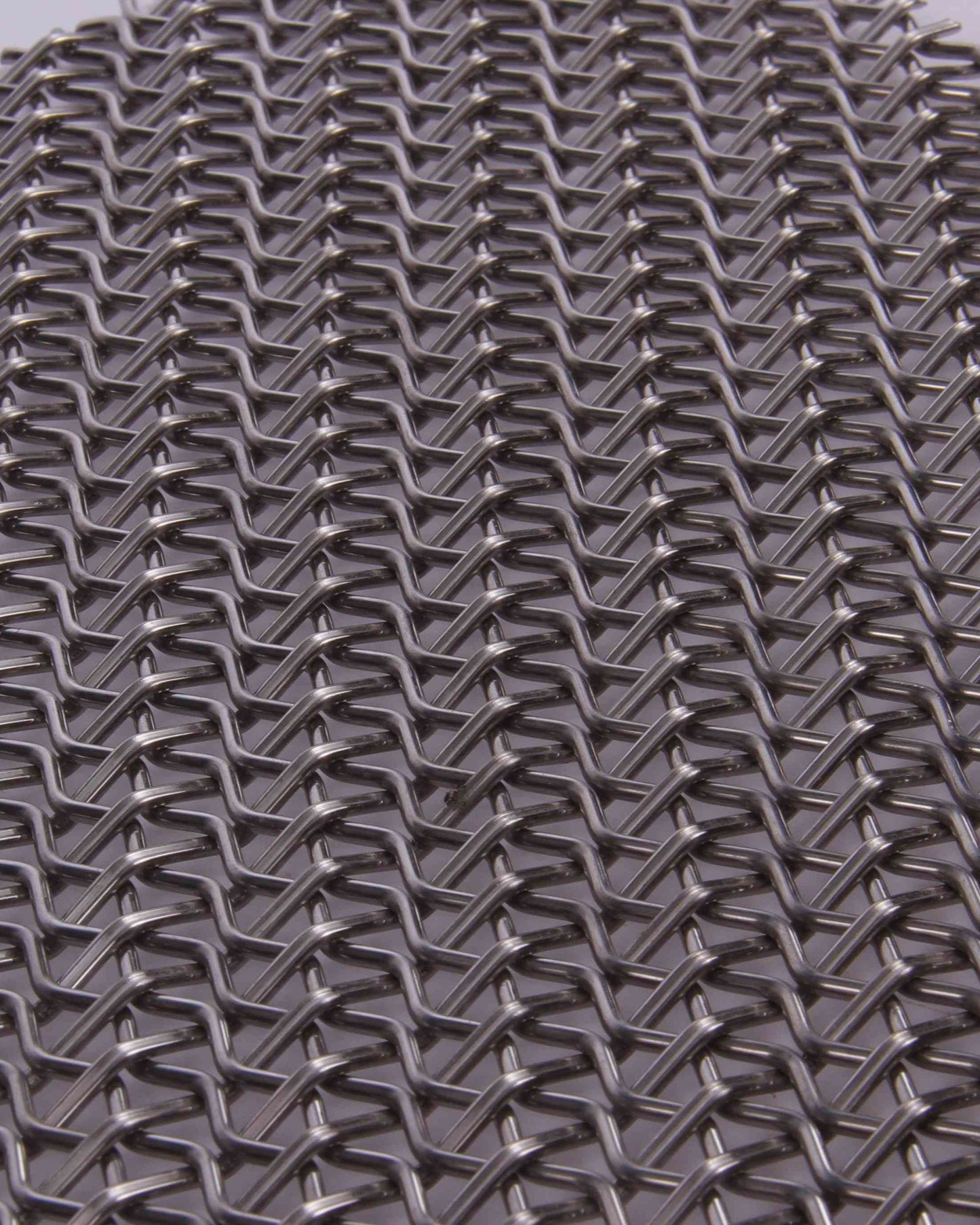 Close-up of a metal mesh with a diamond pattern