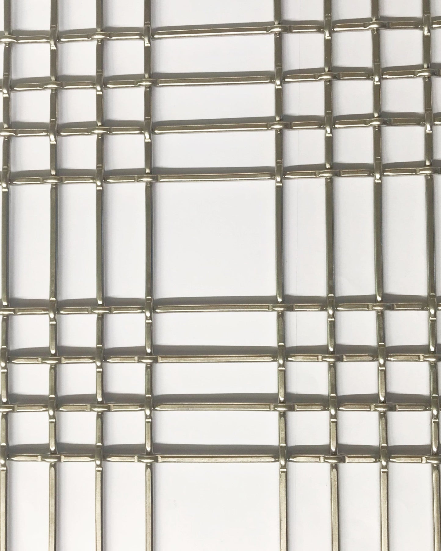 Metallic wire mesh on a white background