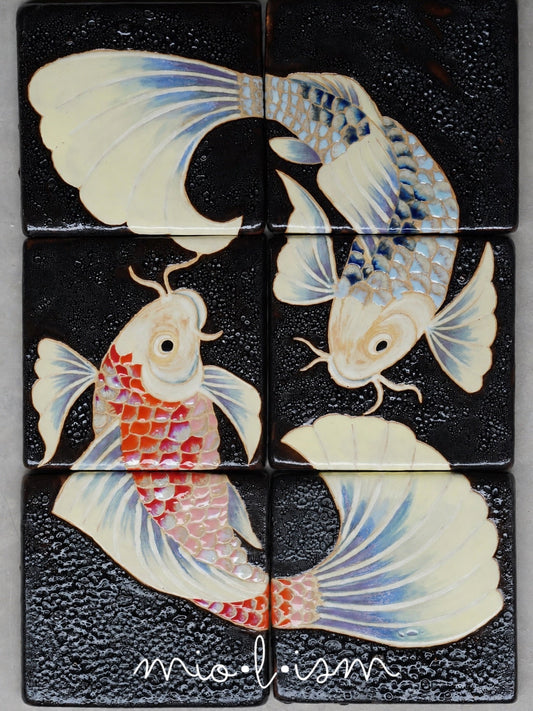 Handcrafted koi ceramic mural with artisan tile art, layered glazes, and black glazed ceramic surface
