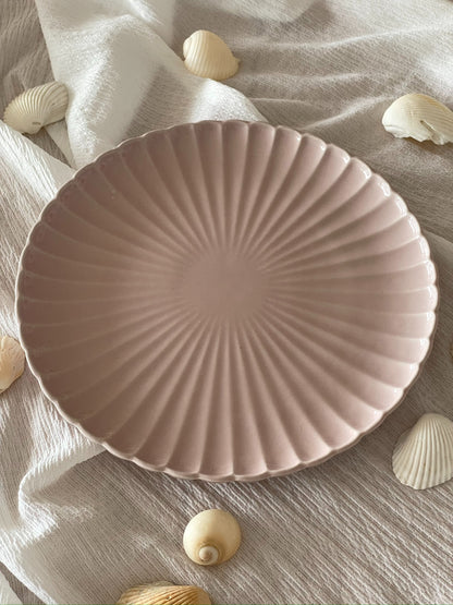 Radiant Seashell Serving Platter with seashells as decorations