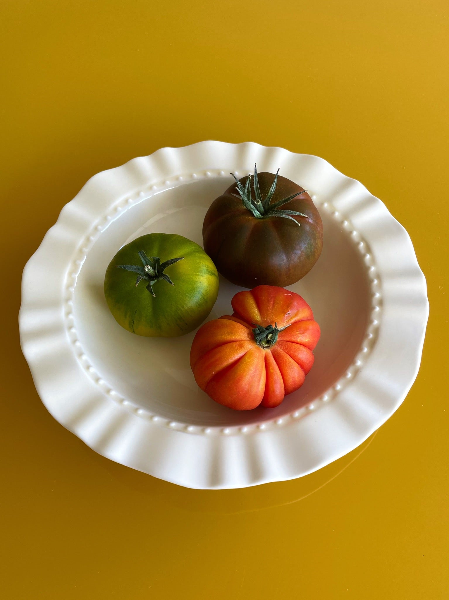 Handmade and hand-painted ceramic plates cream