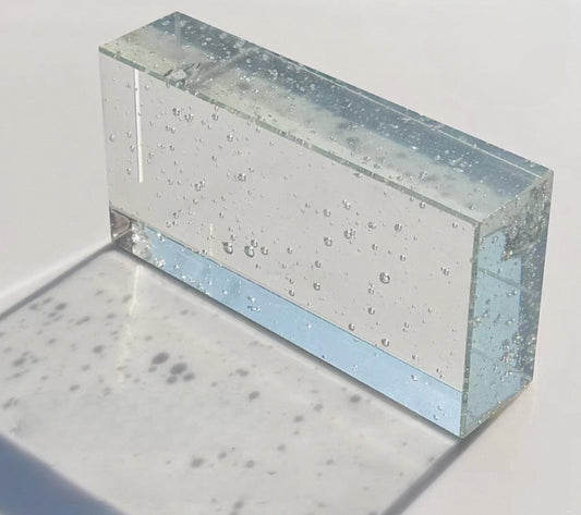Bubble Prism clear glass brick with embedded air bubble texture by MIOLISM