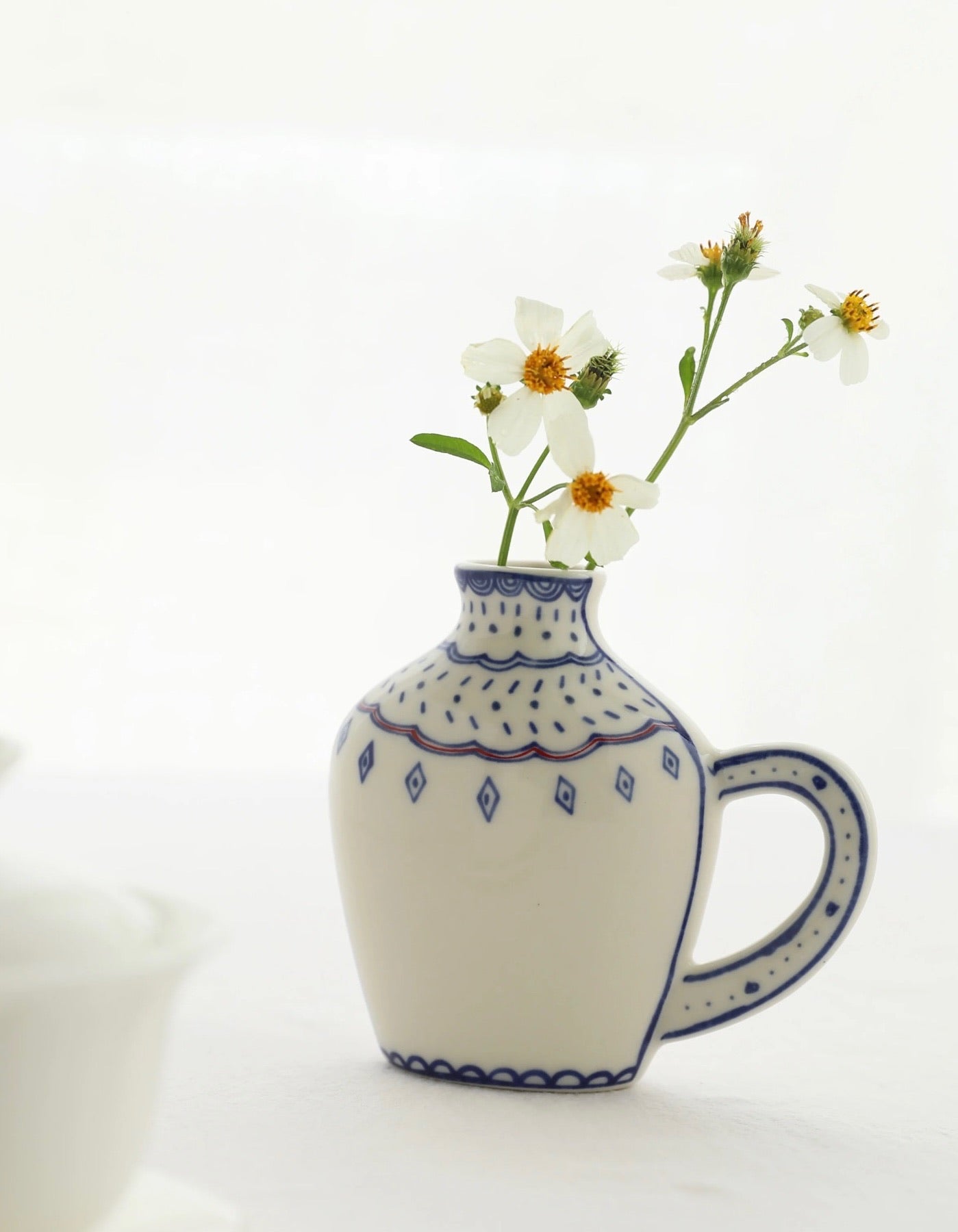 Double-Sided Hand-Painted Artistic Ceramic Bud Vase with handle and flowers