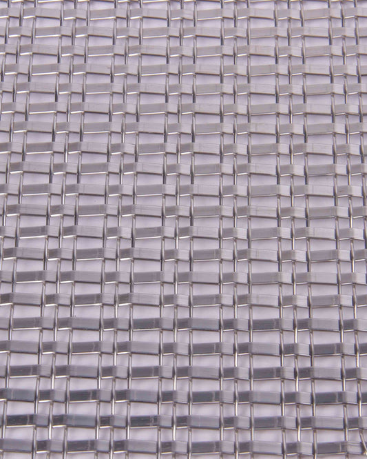 Close-up of a woven pattern with interlocking rectangular shapes in gray tones.
