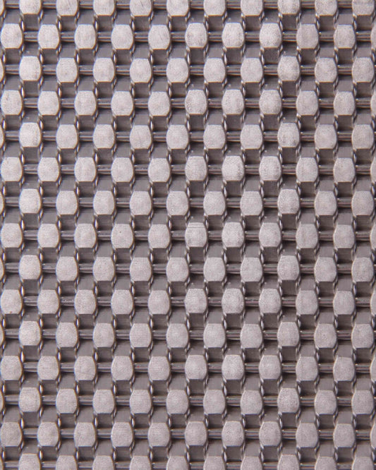 Close-up of a textured fabric with a grid pattern in gray and white.