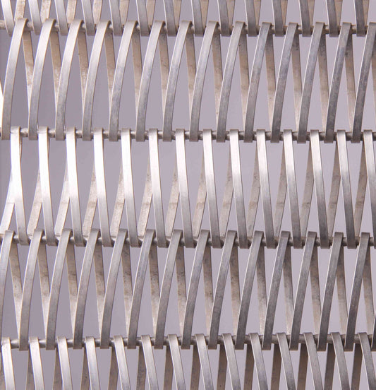 Close-up of a metal mesh with a geometric pattern
